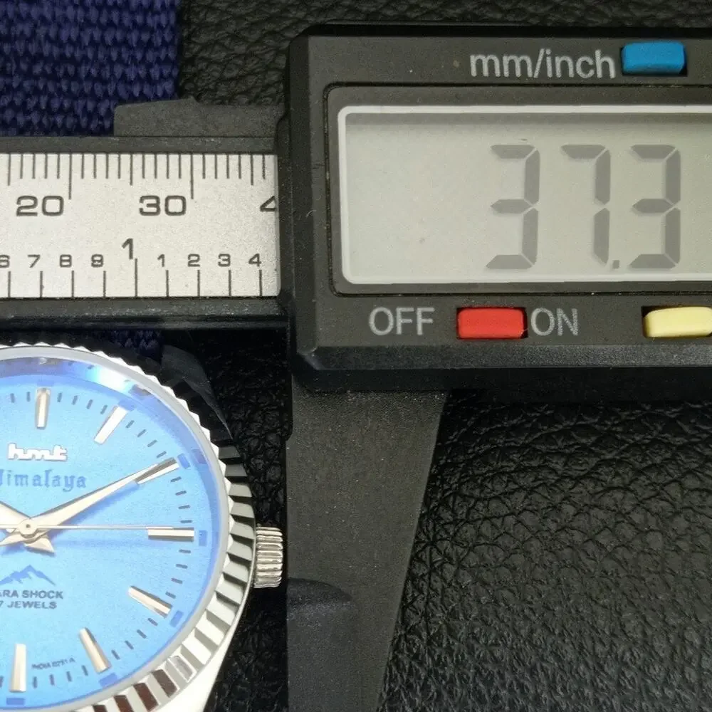 Vintage 1982 HMT Manual Wound Mens Silver Watch & Blue accents
